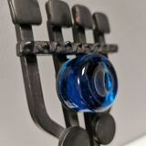 Vintage wall candle holder in wrought iron and hard pressed blue glass.