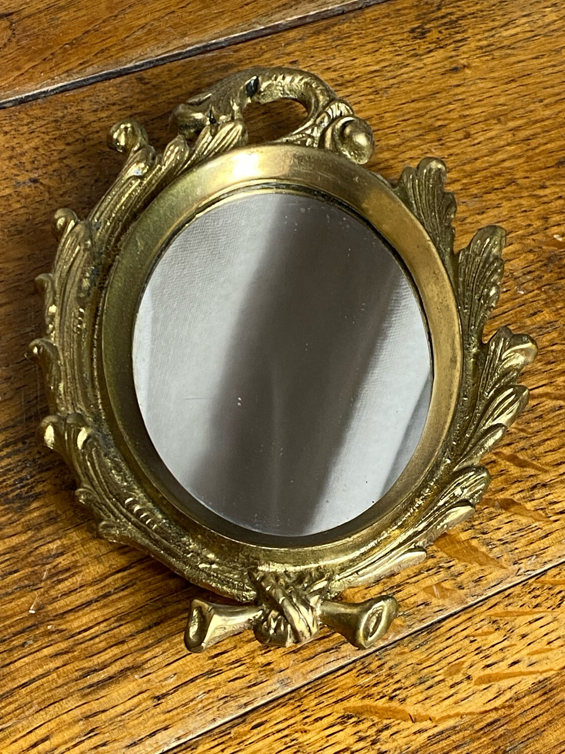 Small antique bronze mirror