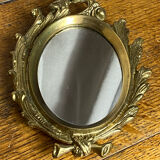 Small antique bronze mirror