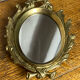 Small antique bronze mirror