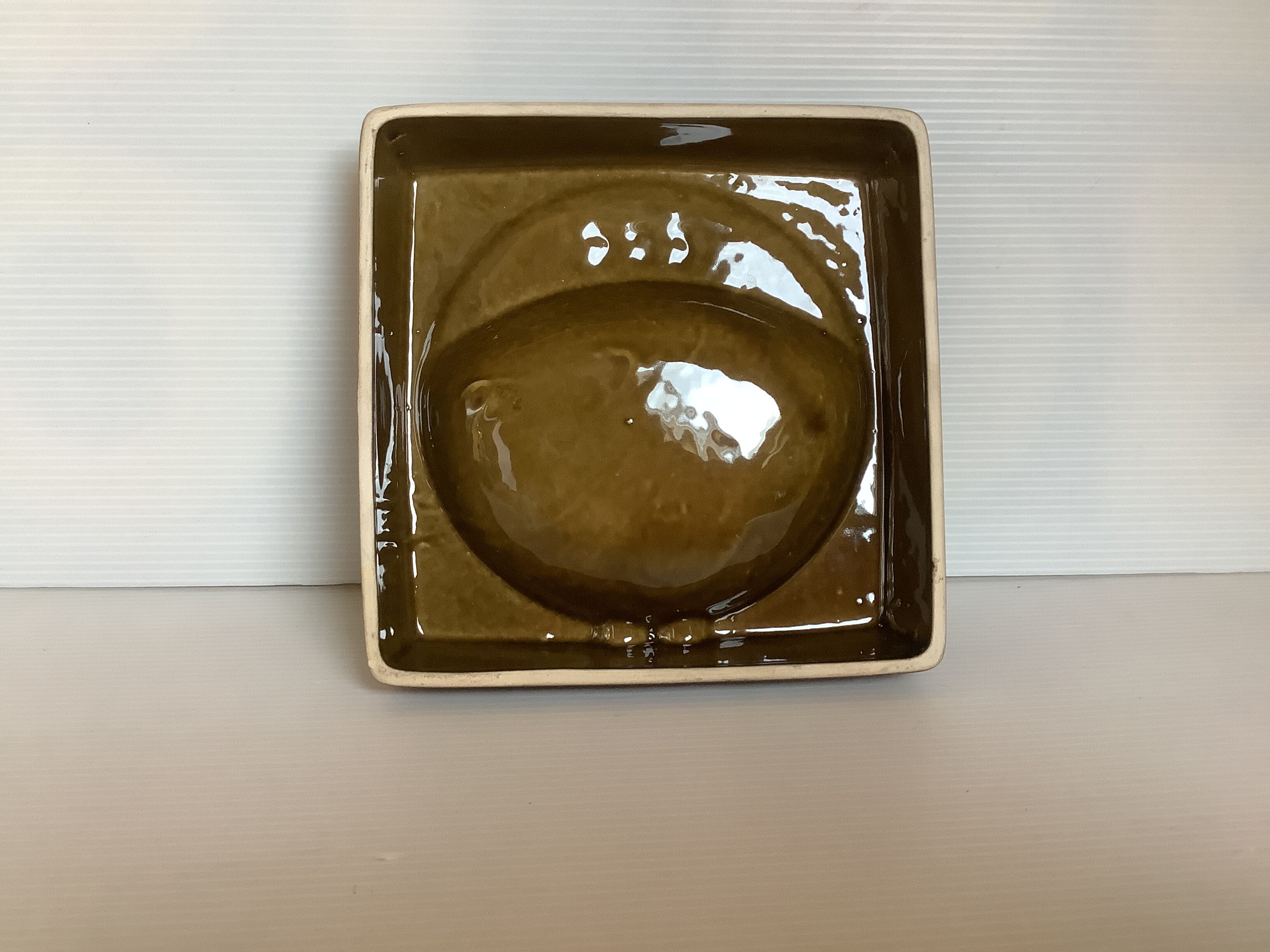 Brown ochre ashtray tray