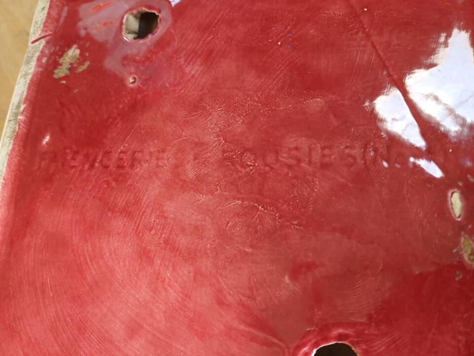 Rusted earthenware ashtray before 1968