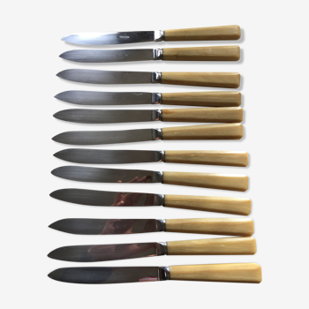 Series of 12 antique stainless steel knives