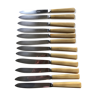 Série de 12 couteaux anciens en inox