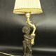 Faun lamp in Clodion style, Louis XVI, early 1900s - gilded and patinated bronze.