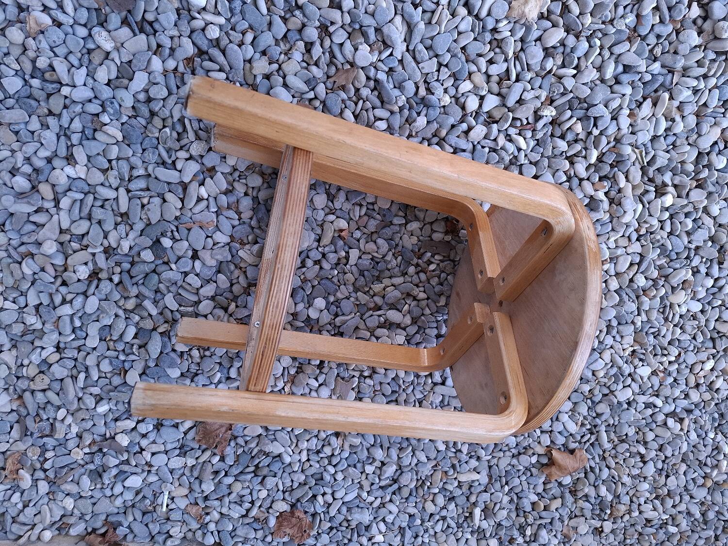 Vintage curved wooden stool