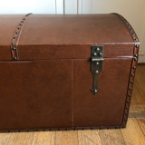 Ancient wooden and faux leather trunk