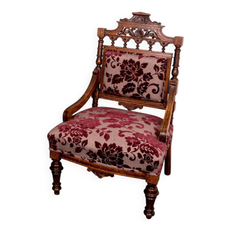 Antique lacquered wooden armchair with burgundy fabric, carved, before 1890.