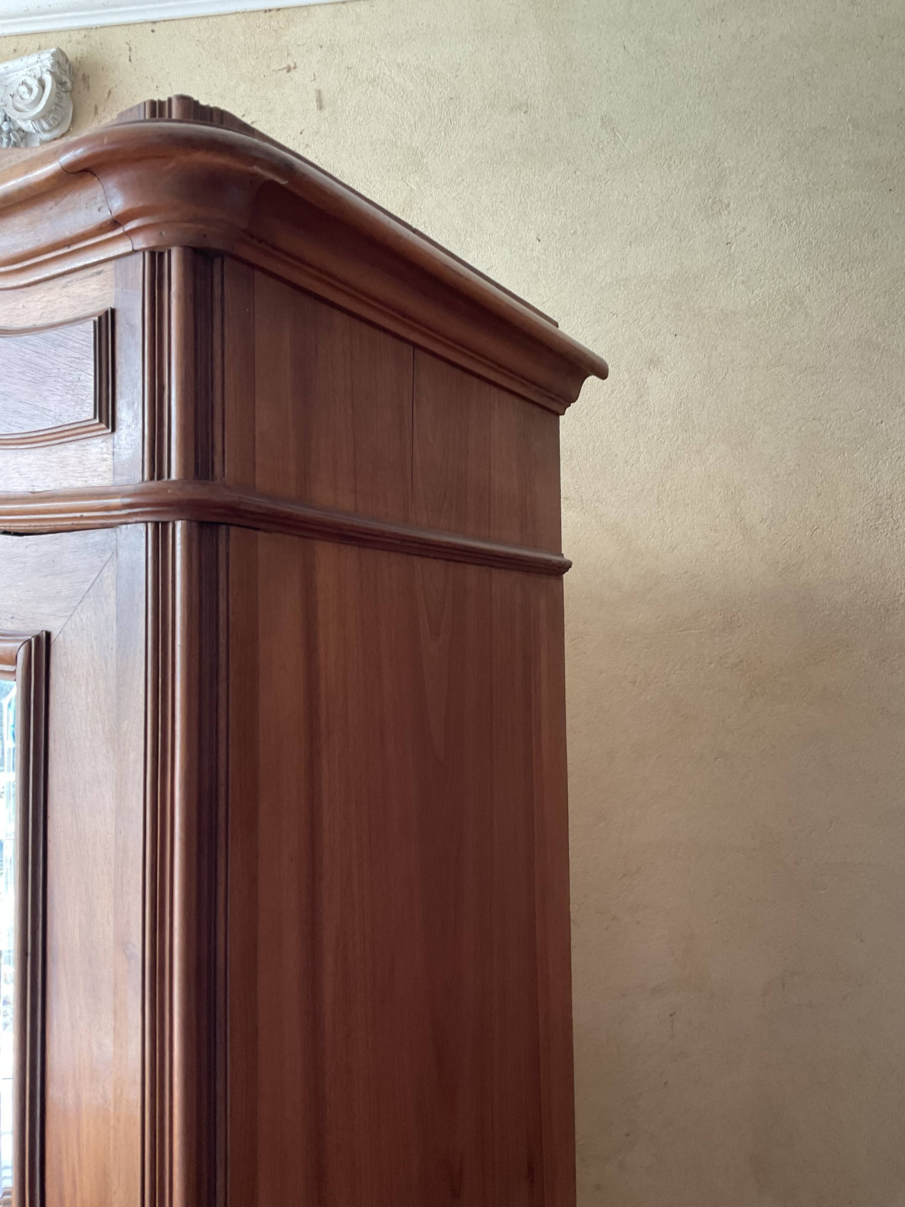 Antique Louis XV style mirrored wardrobe in solid walnut