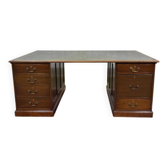 Large English flat desk in mahogany with leather top, early 20th century
