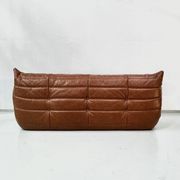 Sofa Togo en cuir cognac attribué à Michel Ducaroy pour Ligne Roset.