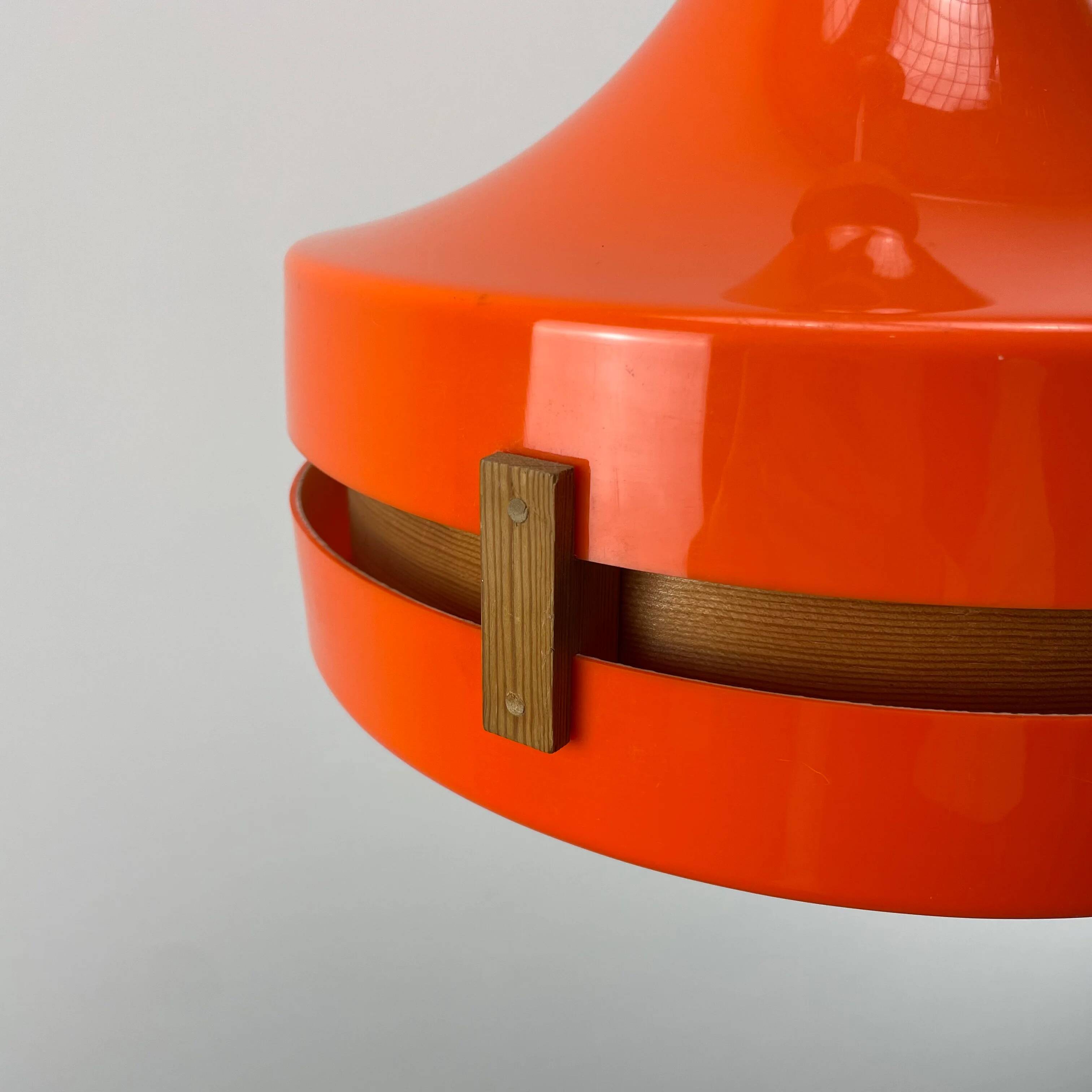 1970s orange Scandinavian suspension light in plexiglass shaped like a UFO.