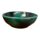 Green glazed ceramic bowl, signed Idlas.