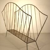 Golden metal magazine rack from the 60s