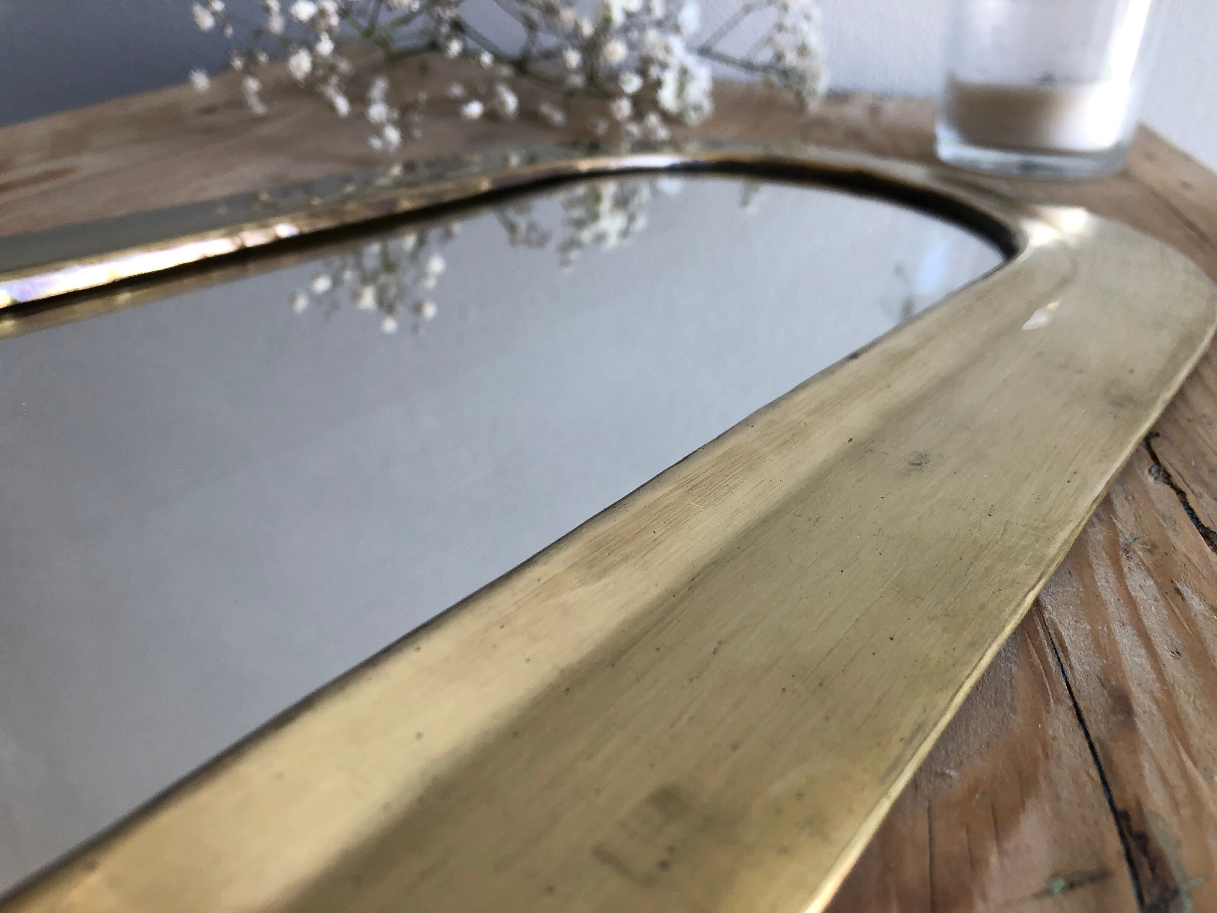 Half moon brass mirror