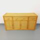 Vintage storage unit in rattan and woven rattan from the 1970s.