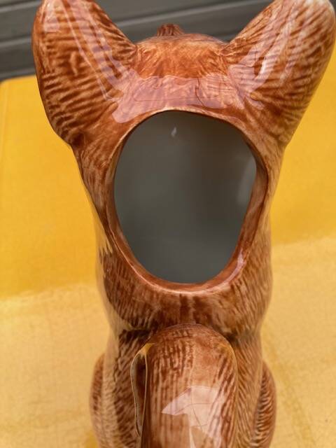Ceramic jug in the shape of a fox.