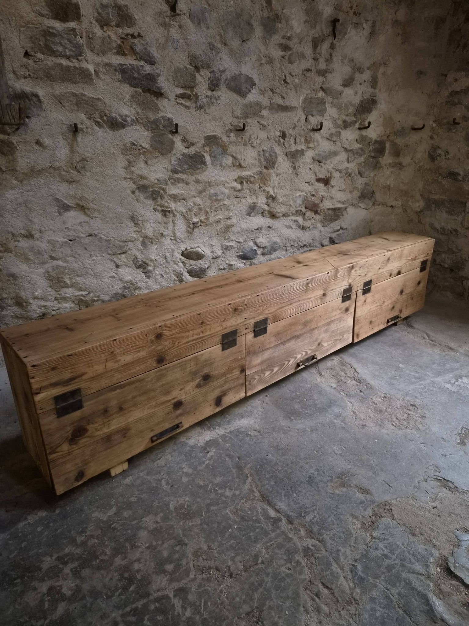 Old French industrial workshop furniture in pine / storage bench, circa 1880–1900