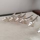 Silver metal knife holders with Dachshund dogs