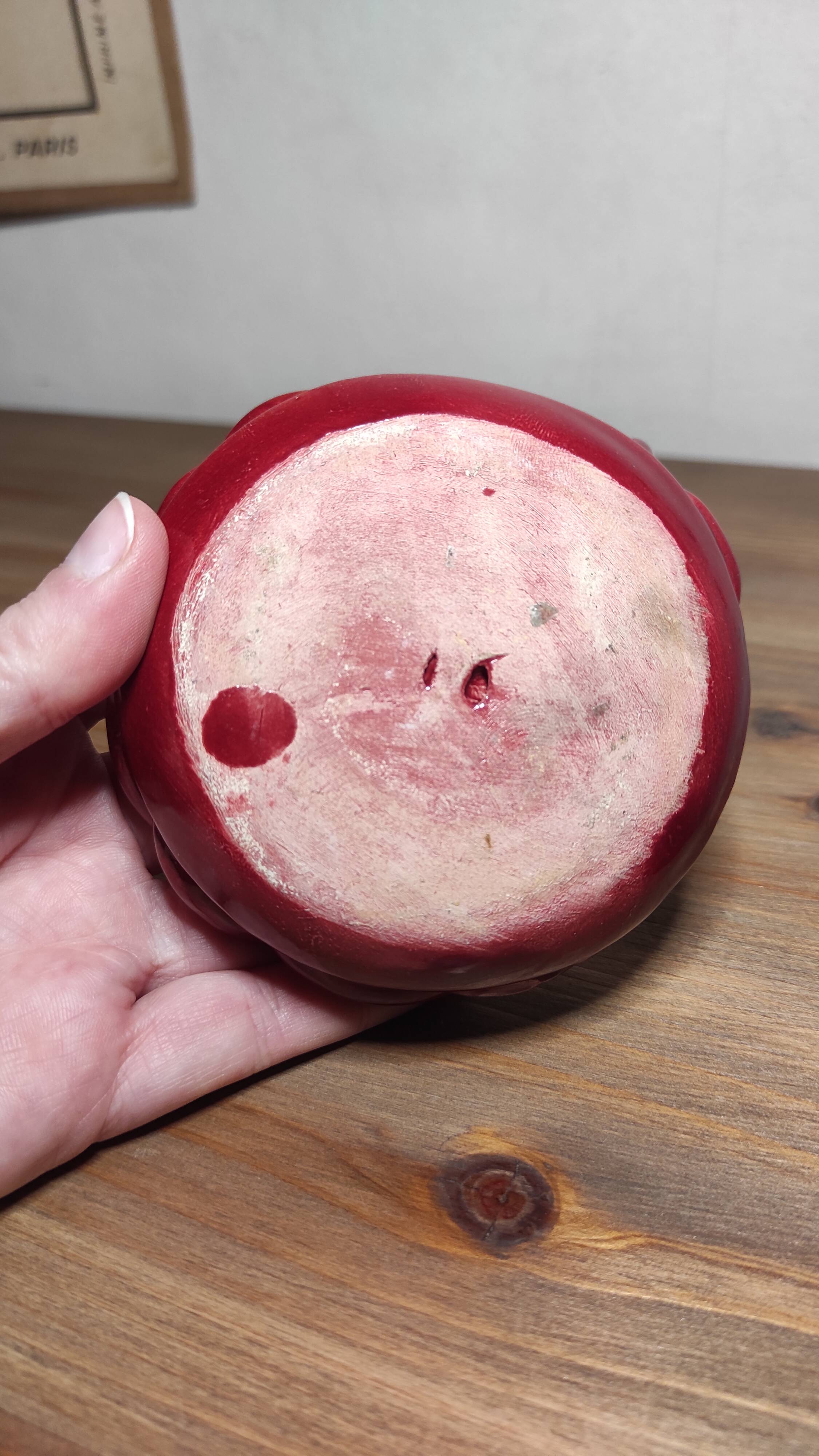 Twisted red earthenware candle holder