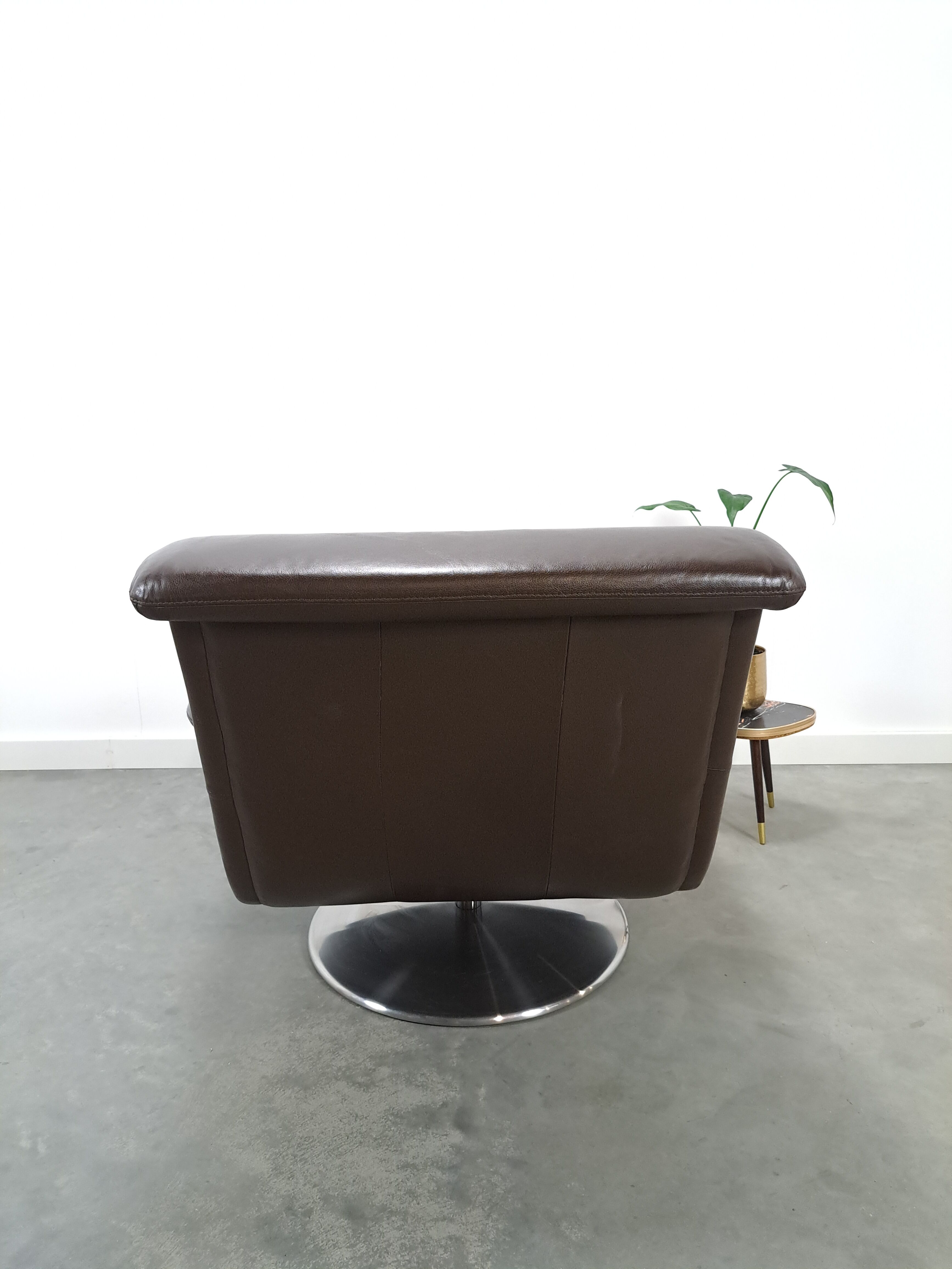 Brown leather swivel chair
