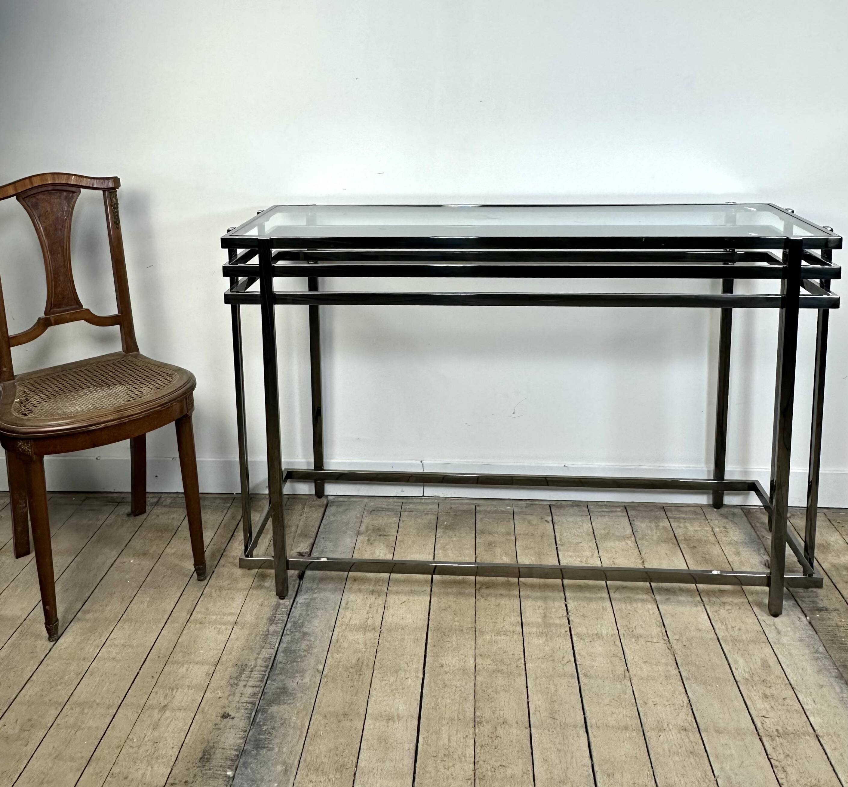 Smoked silver metal console from the 2000s.