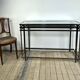 Smoked silver metal console from the 2000s.