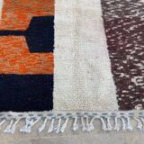 Handmade wool rug in colourful patterns, size 150x250 cm.