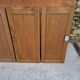 Oak workshop furniture with sliding doors.