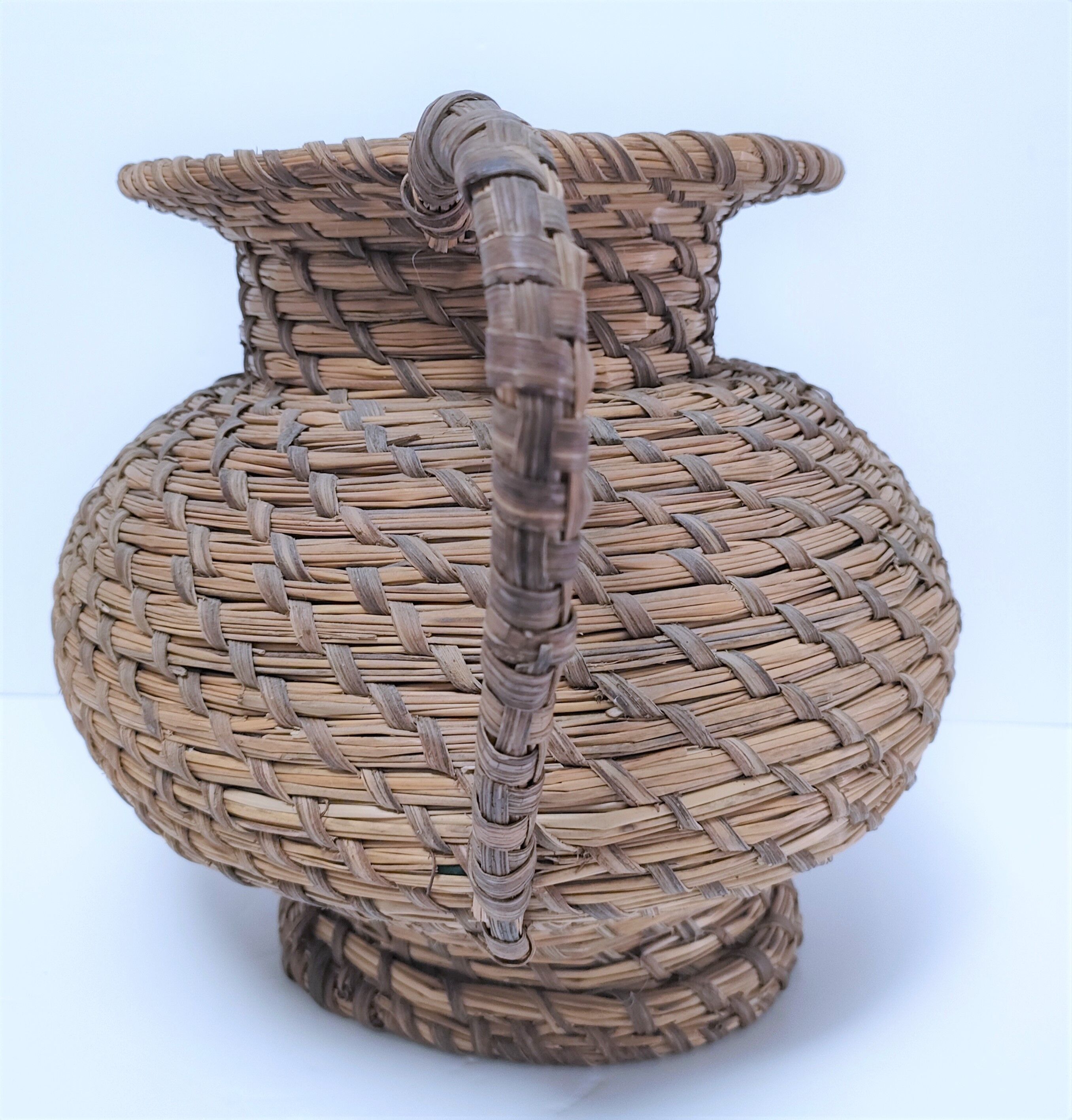 Vase in straw and plant fibers French folk art mid-twentieth century