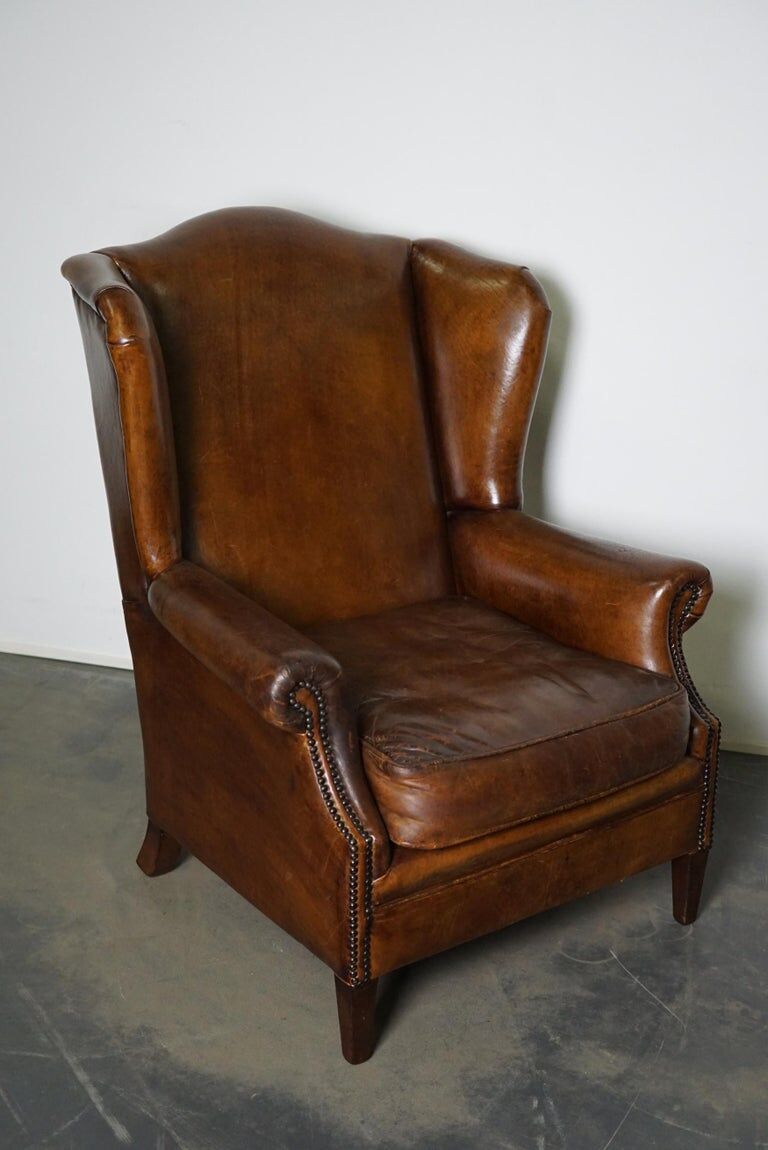 Fauteuil club vintage en cuir de couleur cognac Pays-Bas
