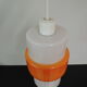 White and orange opaline suspension