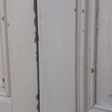 Pair of cupboard doors and old woodwork frame