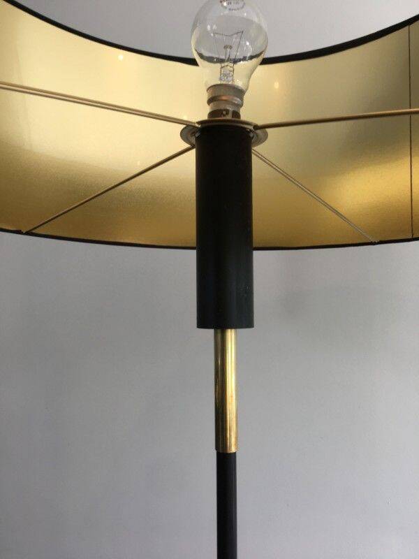 Designer floor lamp in black lacquered metal and brass