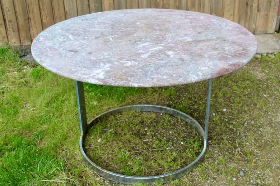 Round marble table with chrome base.