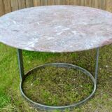 Round marble table with chrome base.