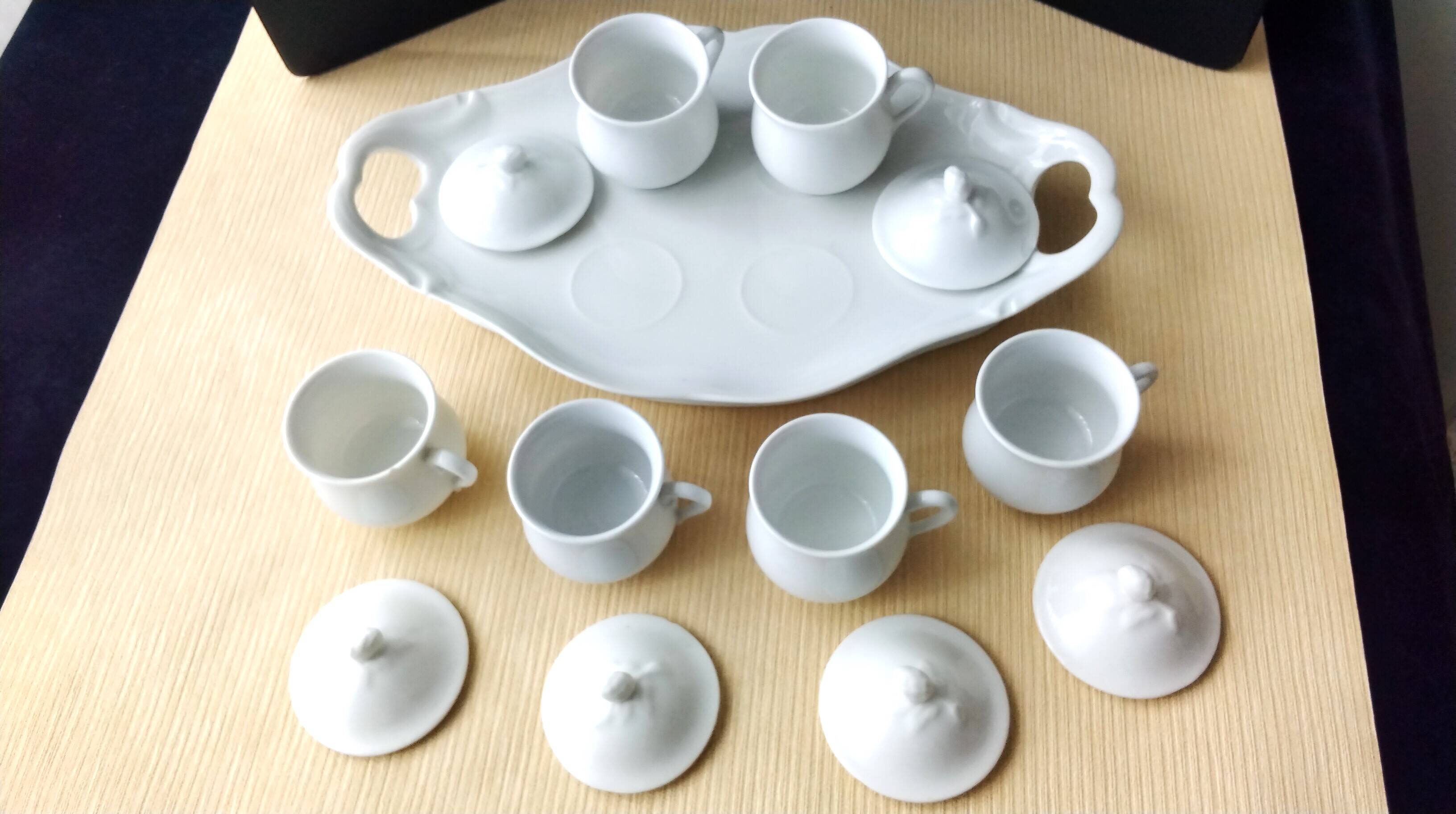 Antique white porcelain cream service