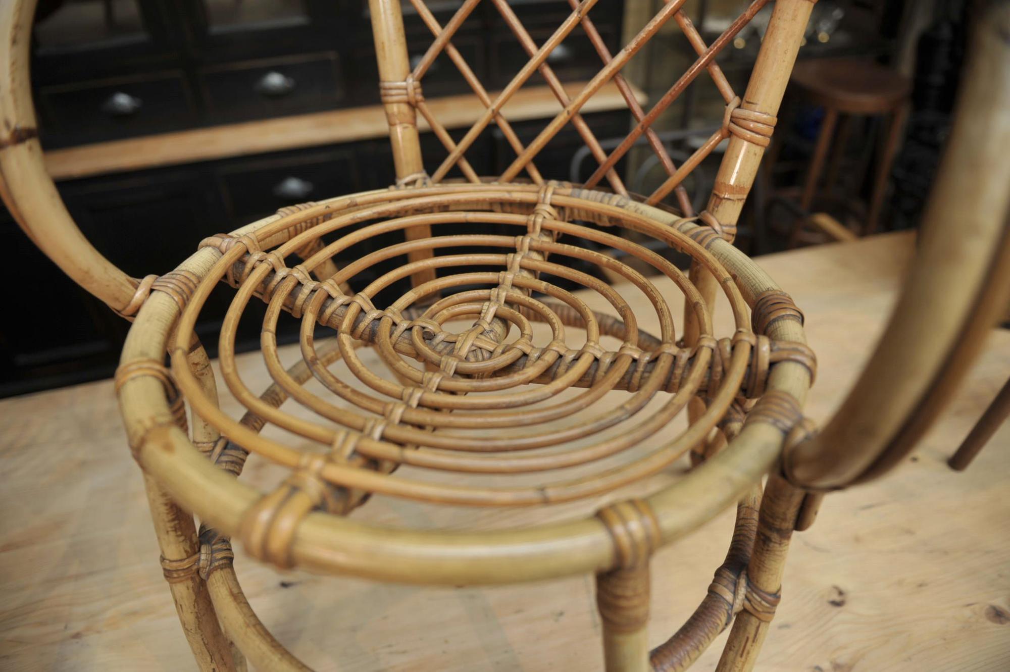 Pair of chairs in rattan 1960 by Louis Sognot