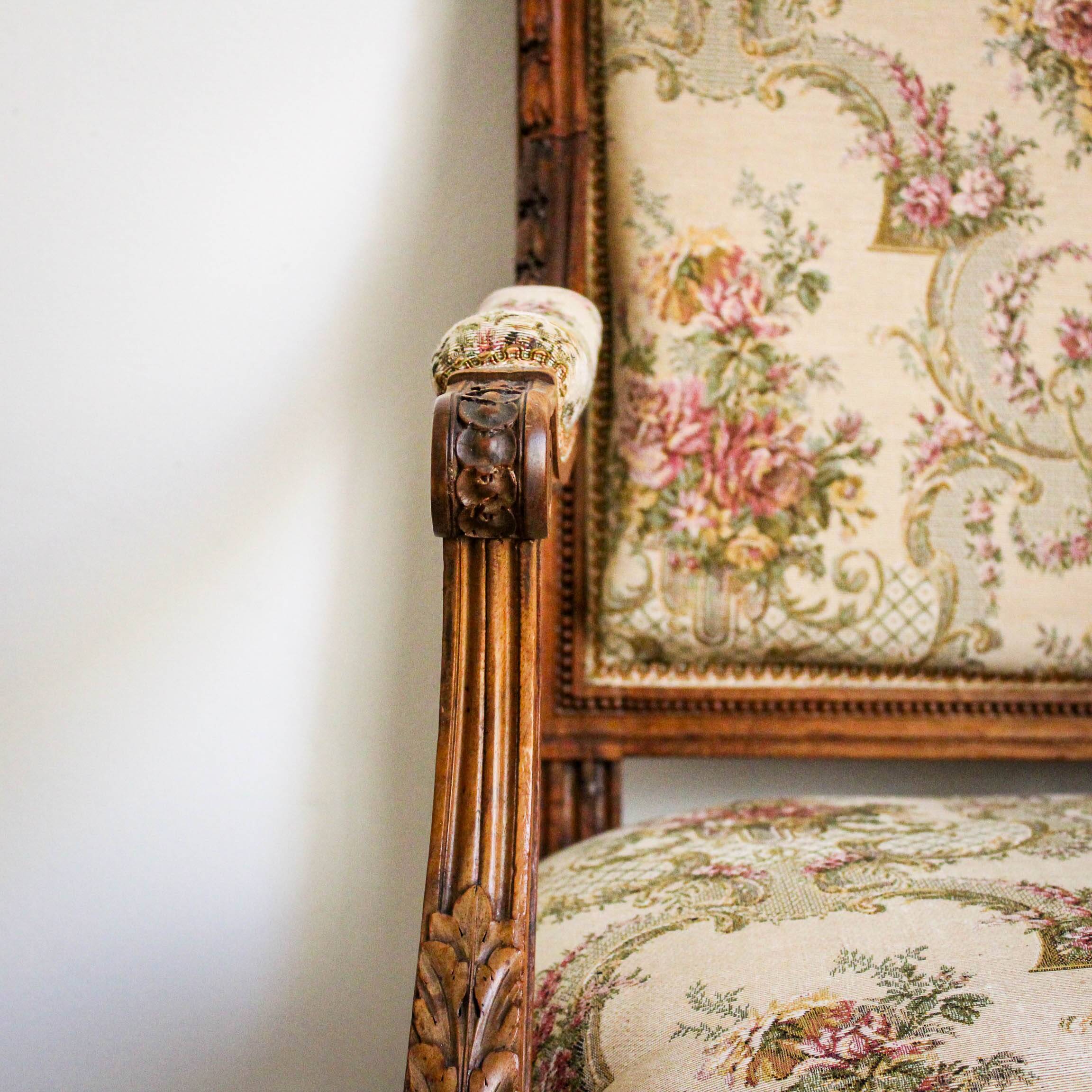 Louis XVI style carved armchair