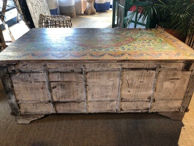 Coffee table chest painted with patterns