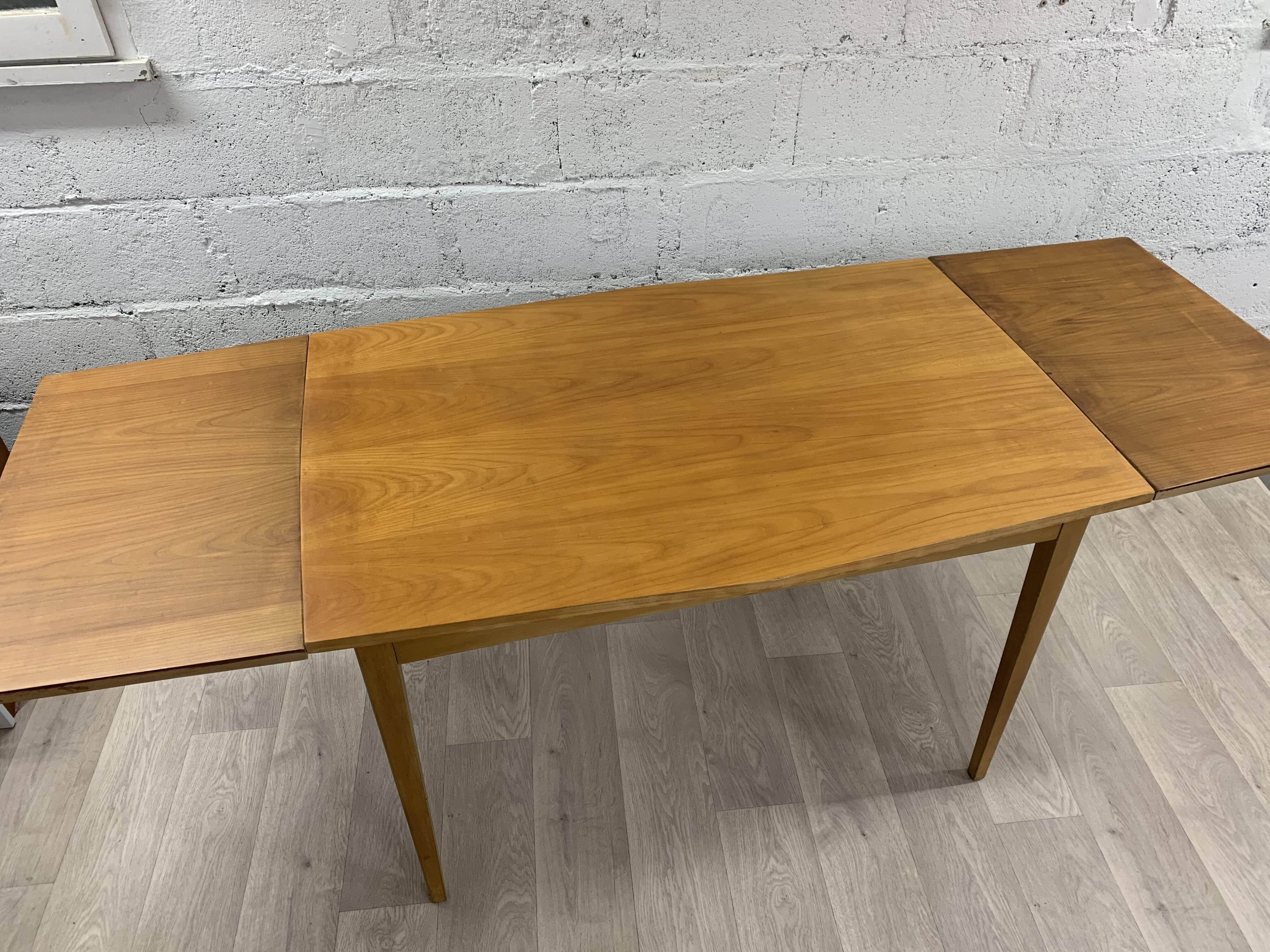 Light-wood dining table by L'bke