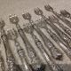 11 silver oyster forks, 800 Minerva style, Louis Philippe