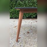 Table de salle à manger à pieds compas