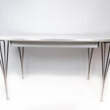 Super Ellipse dining table with white laminate by Piet Hein and Arne Jacobsen