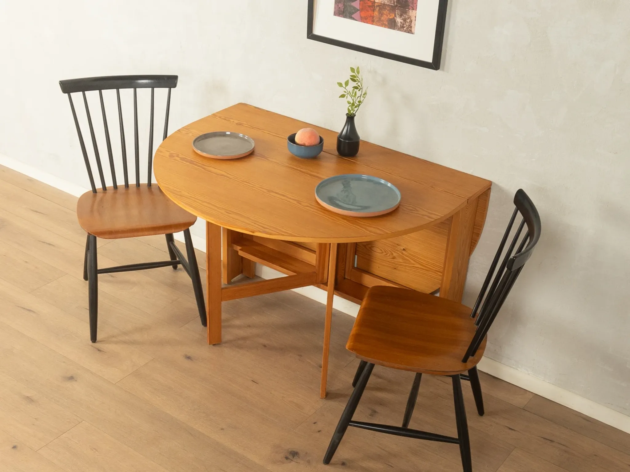 Practical folding table from the 1980s made of light brown pine wood