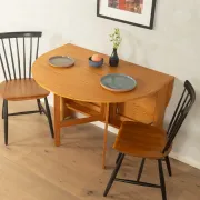 Practical folding table from the 1980s made of light brown pine wood