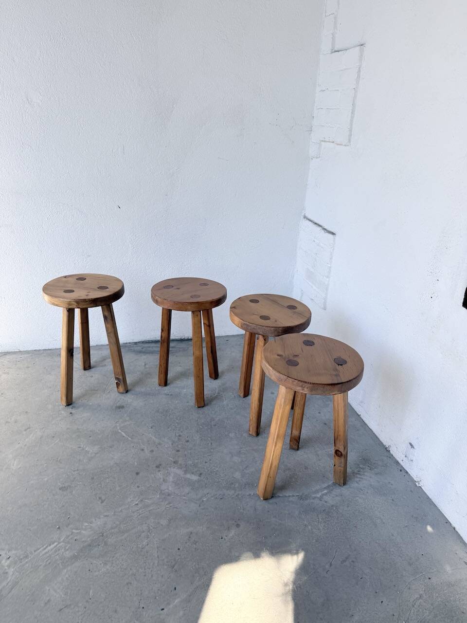 Set of 4 tripod stools from the 1950s.