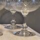 8 antique Baccarat crystal champagne coupes with engraved decoration.