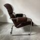 Midcentury tubular chromed chairs with leather cushions