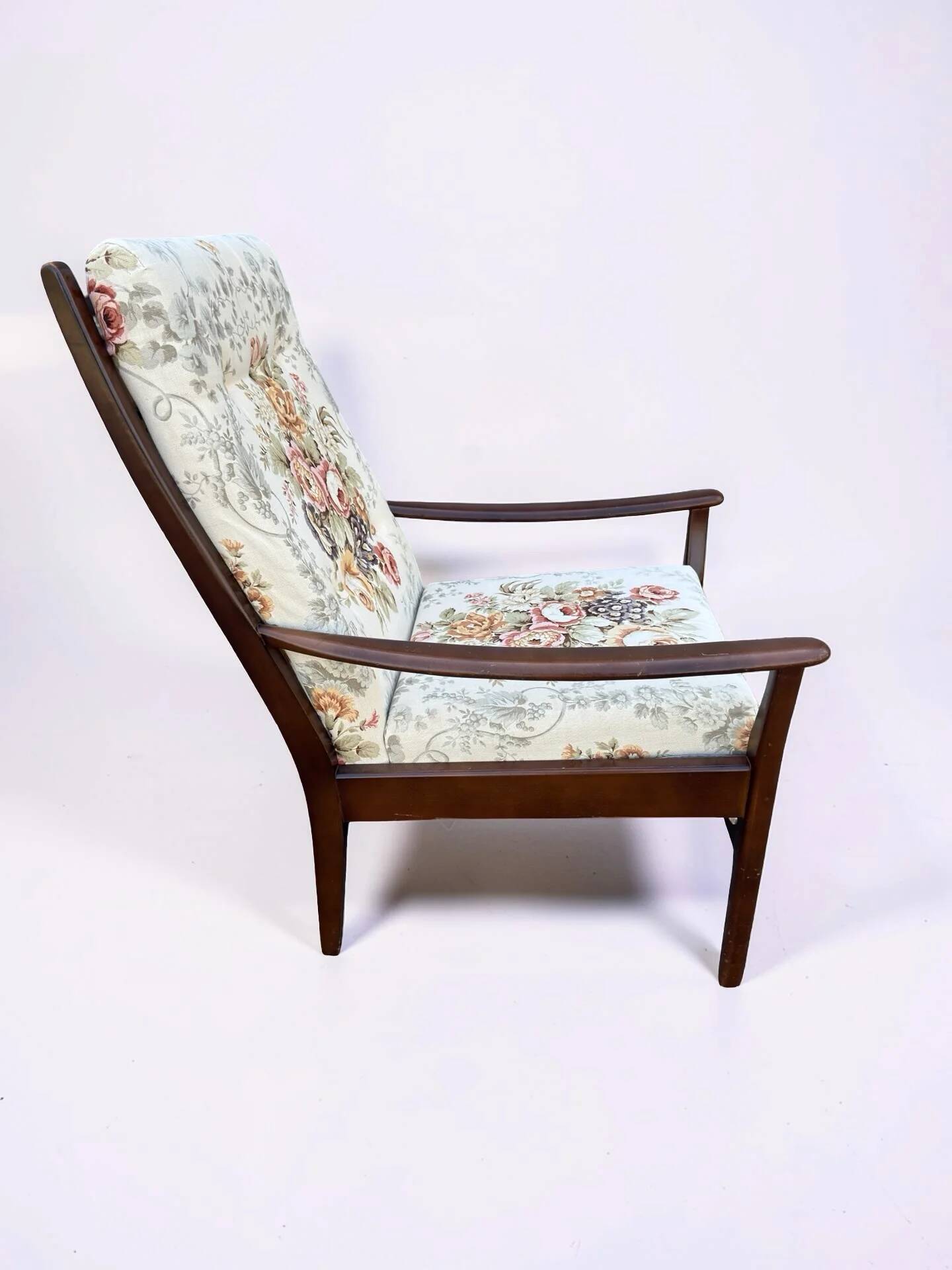 Vintage teak armchair with floral upholstery